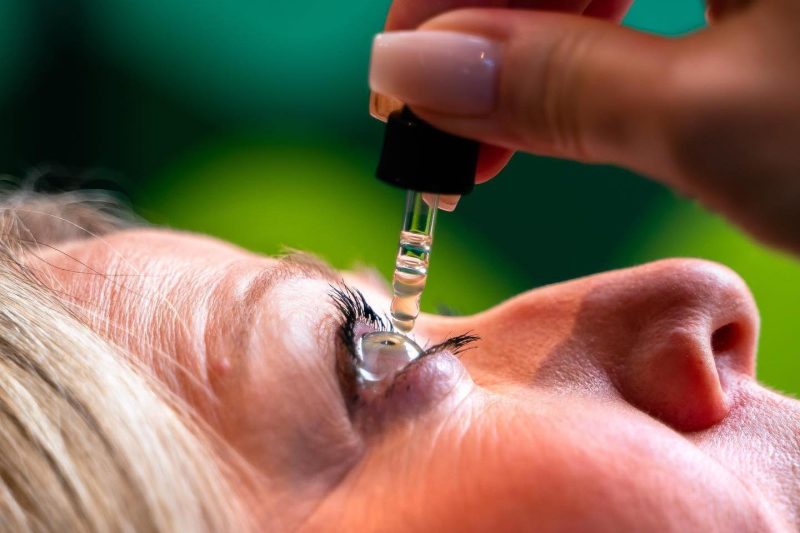 woman administering prp eye drops for dry eye